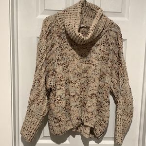 Ivory with specks of brown tan and light blue